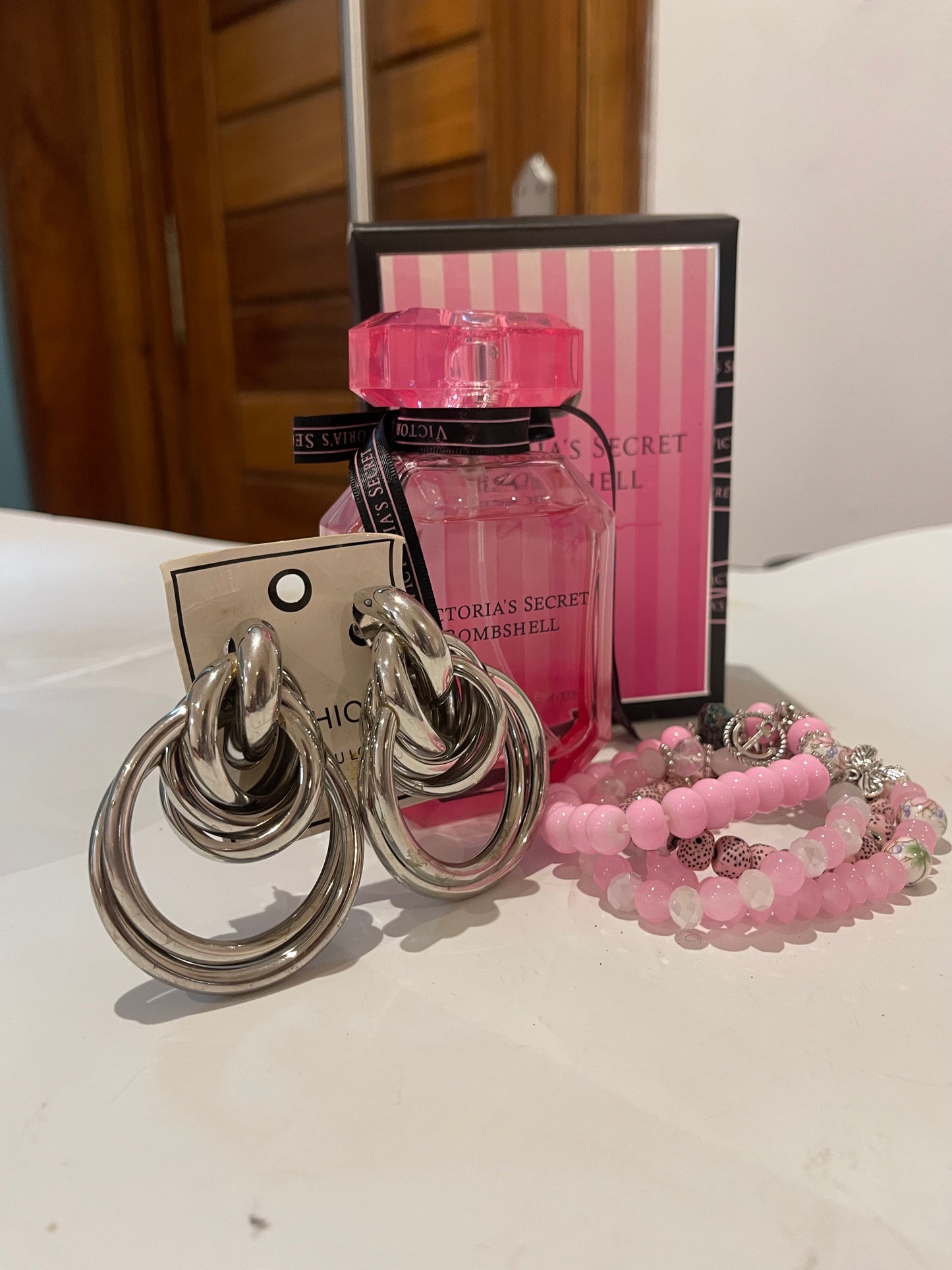Combo deal perfume , earrings and bracelet