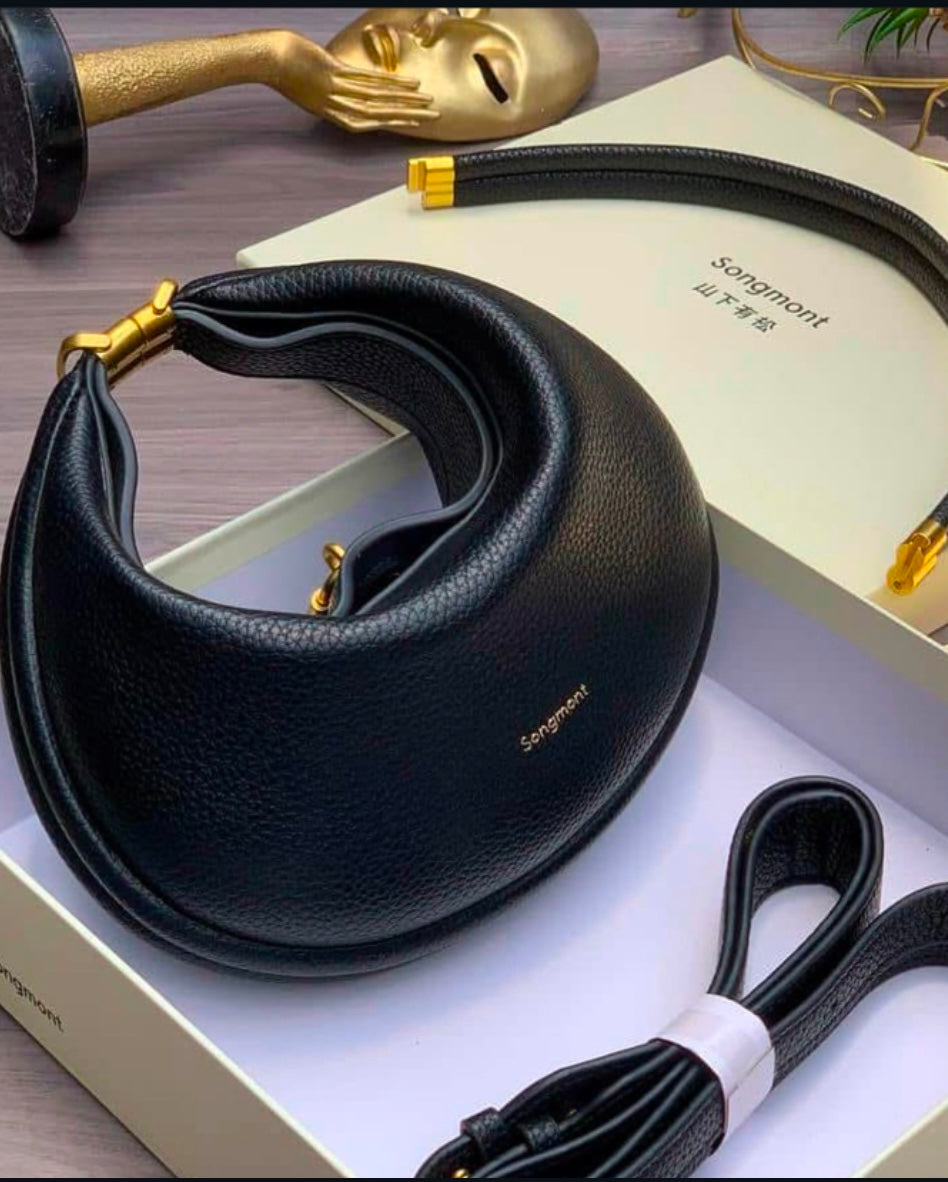 Black songemont detailed handbag with box and different straps