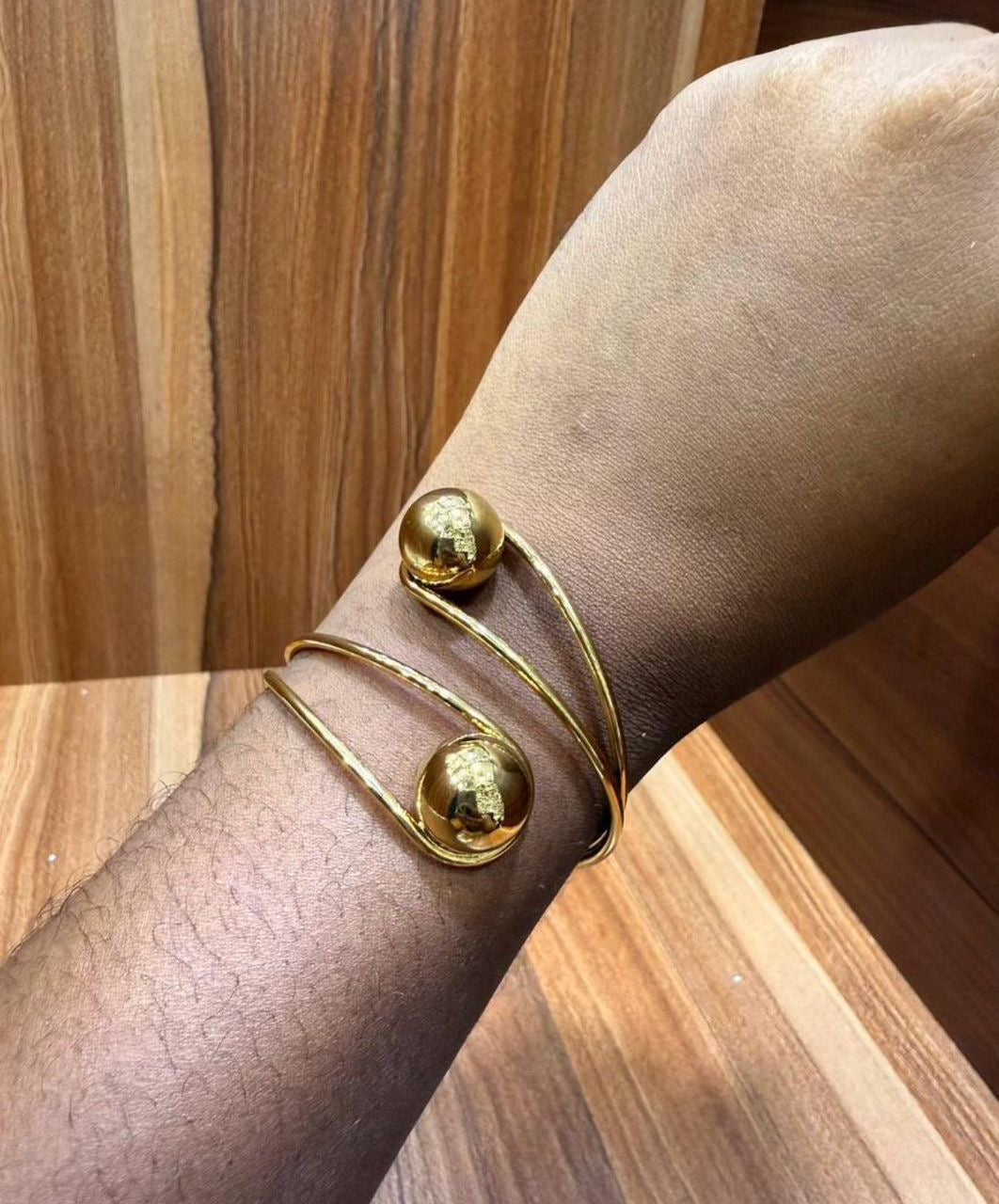 gold bangle with detailing