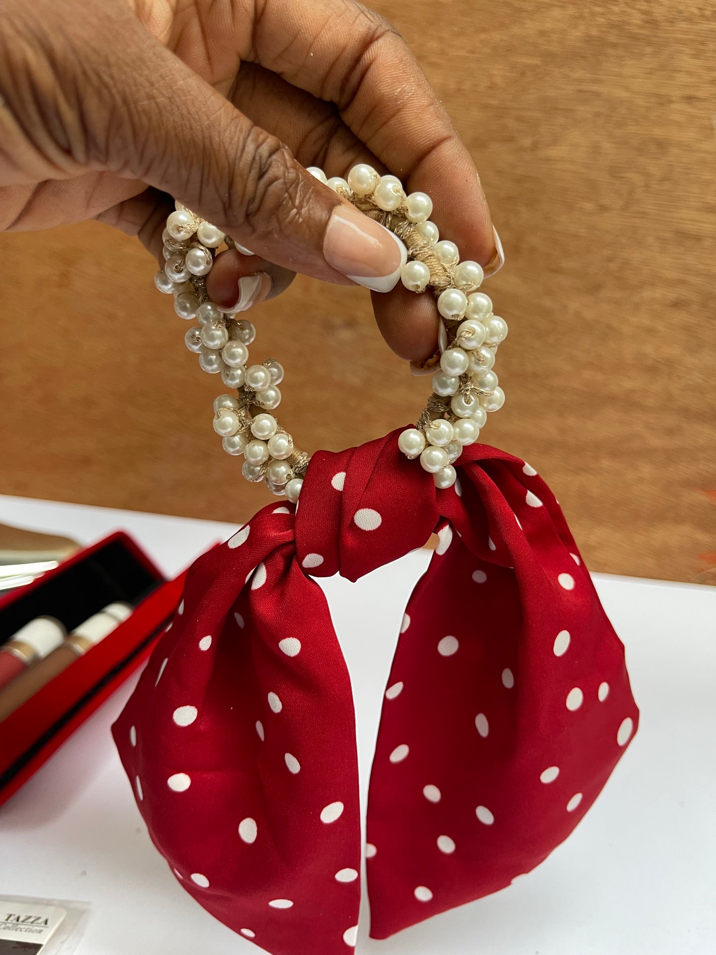 red polka dotted hairband