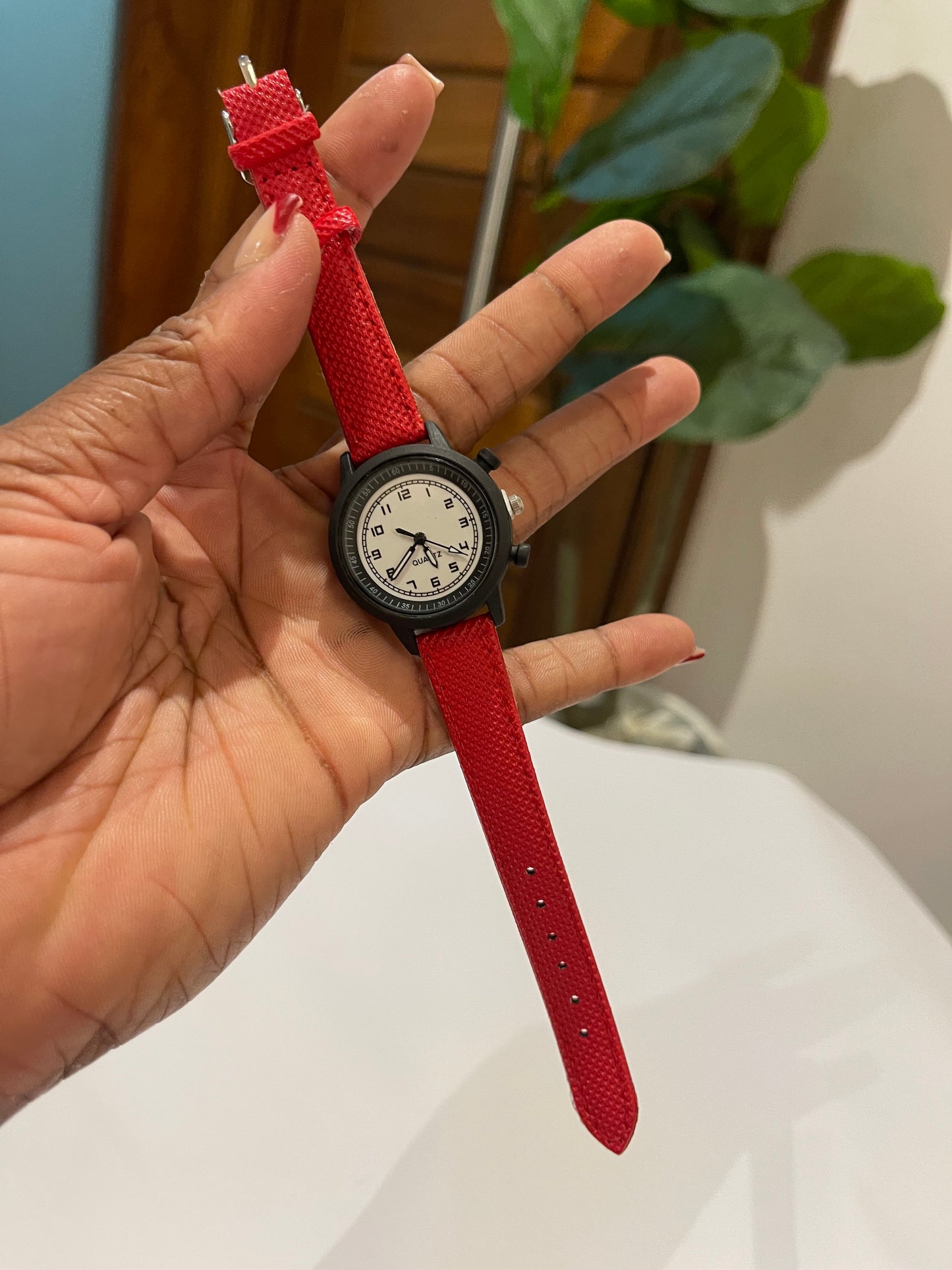 Red detailed wristwatch