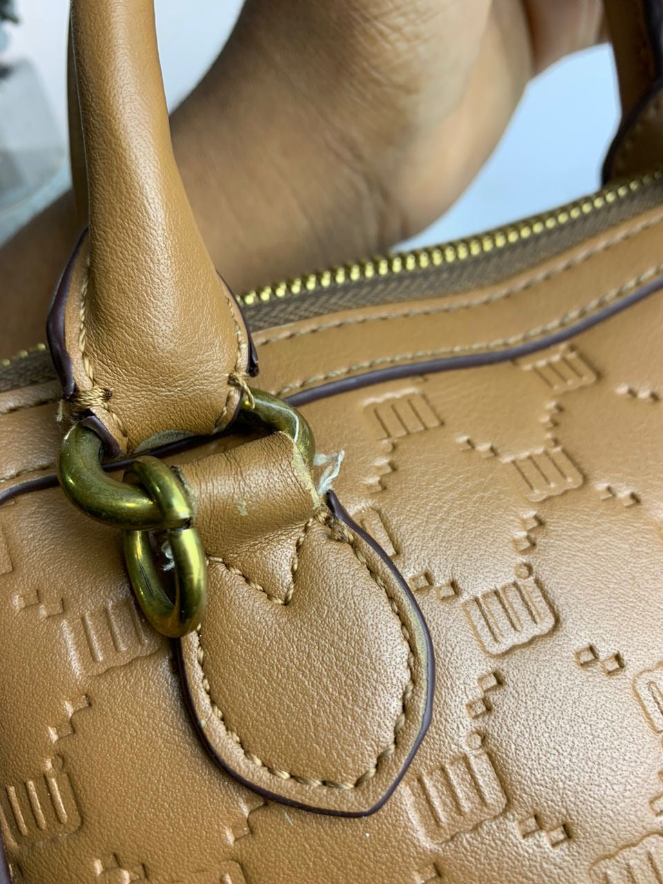 Brown detailed monogrammed bag