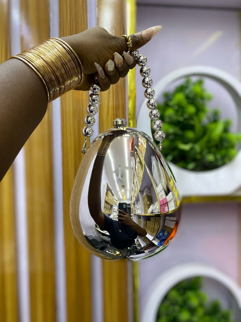 Silver egg inspired purse