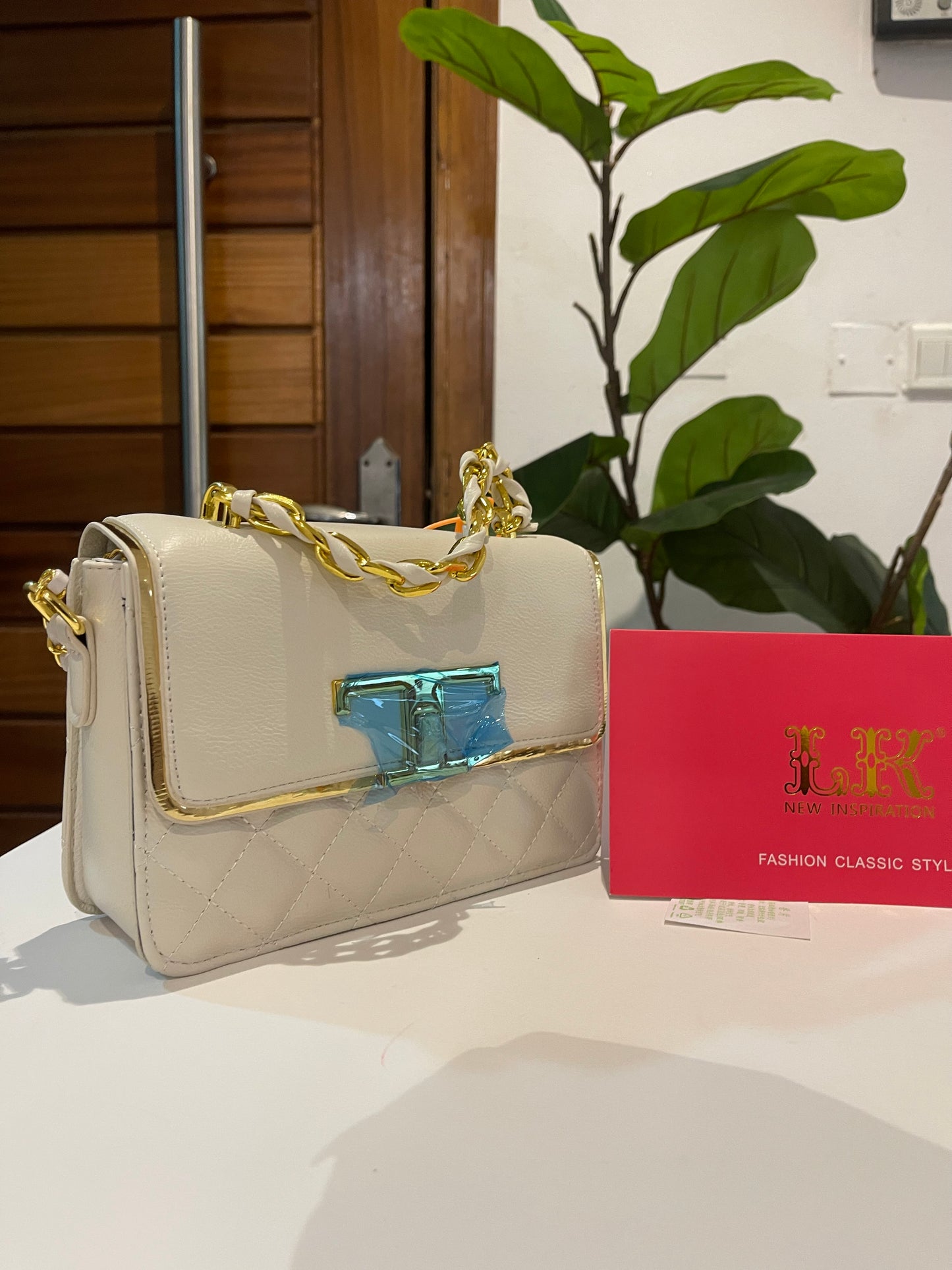 Off white structured side bag with gift bag and gift card