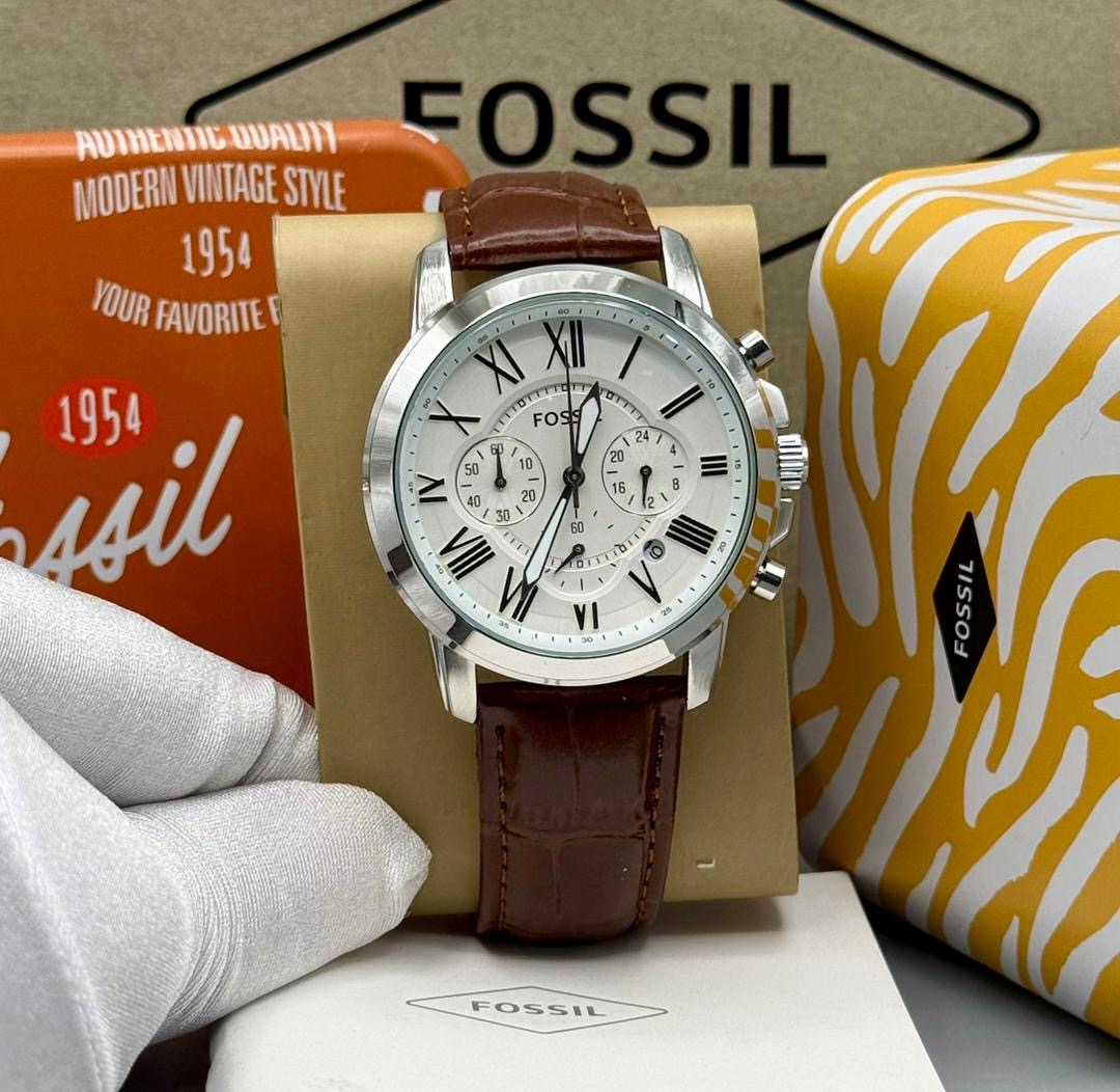 Brown fossil watch with box