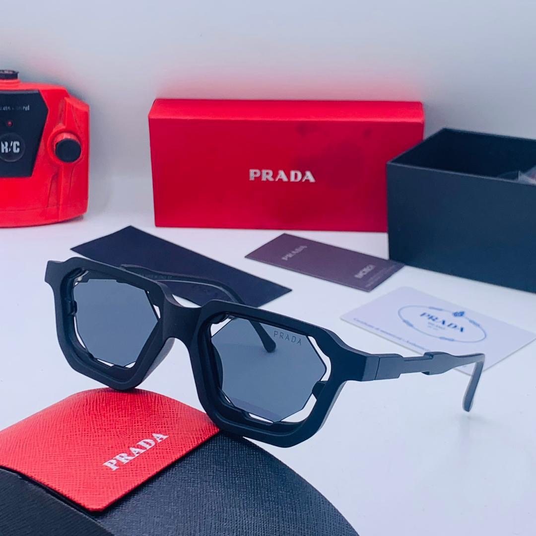 Prada sunglasses with box and accessories