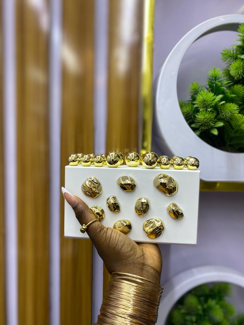 White detailed stone purse