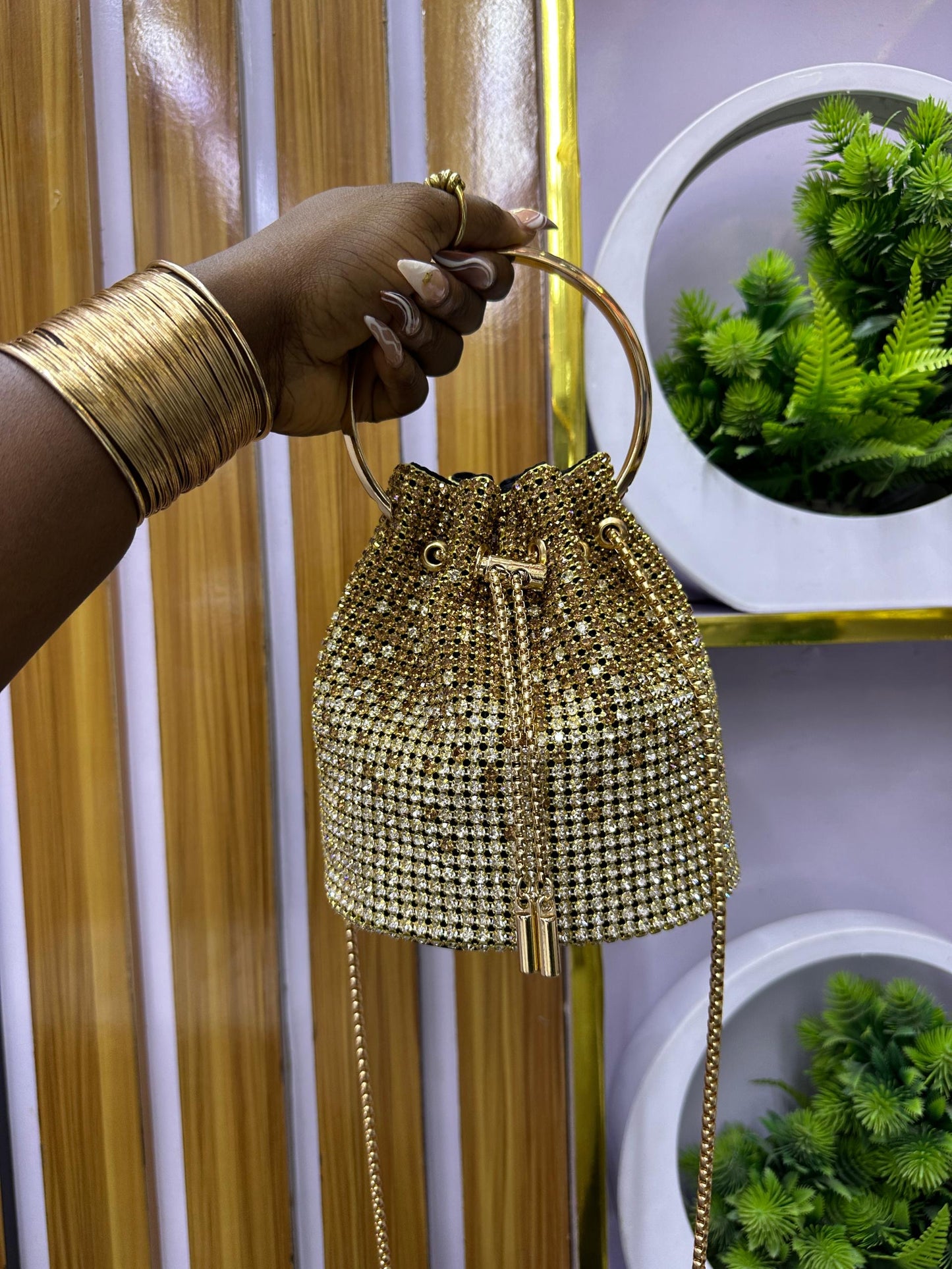Gold drawstring purse with tassels