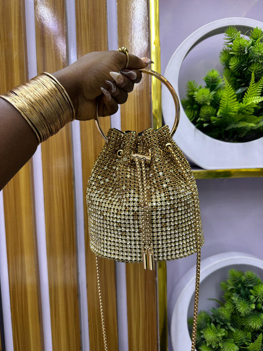 Gold drawstring purse with tassels