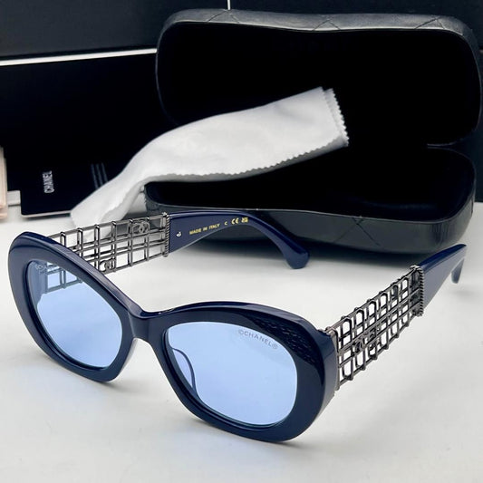 perforated sunglasses with box and dust bag