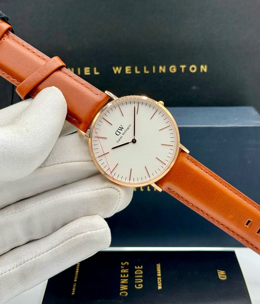 Brown leather Daniel Wellington watch with box and bag
