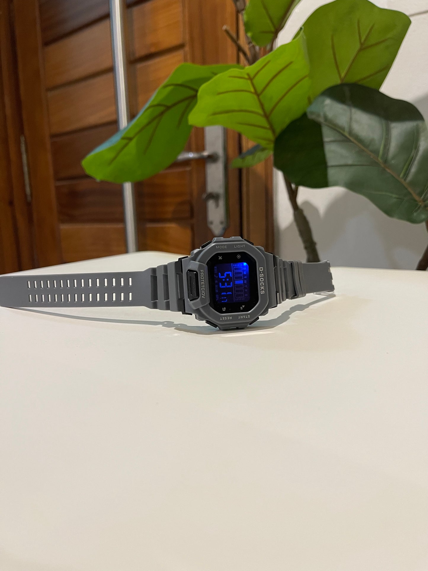 Gray Digital watch with alarm nd light with timer