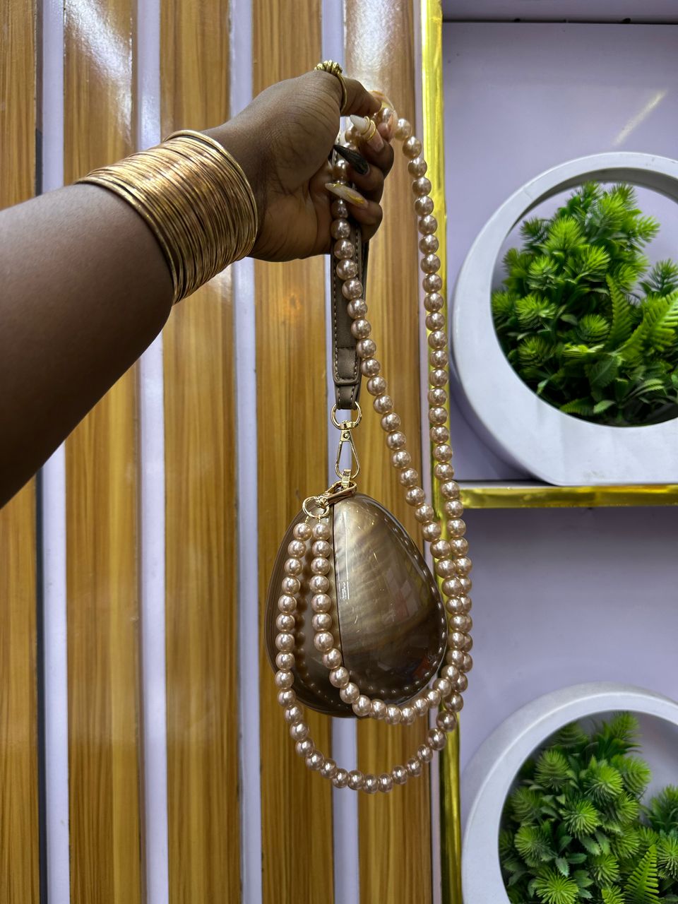 Egg shaped pearl drop purse