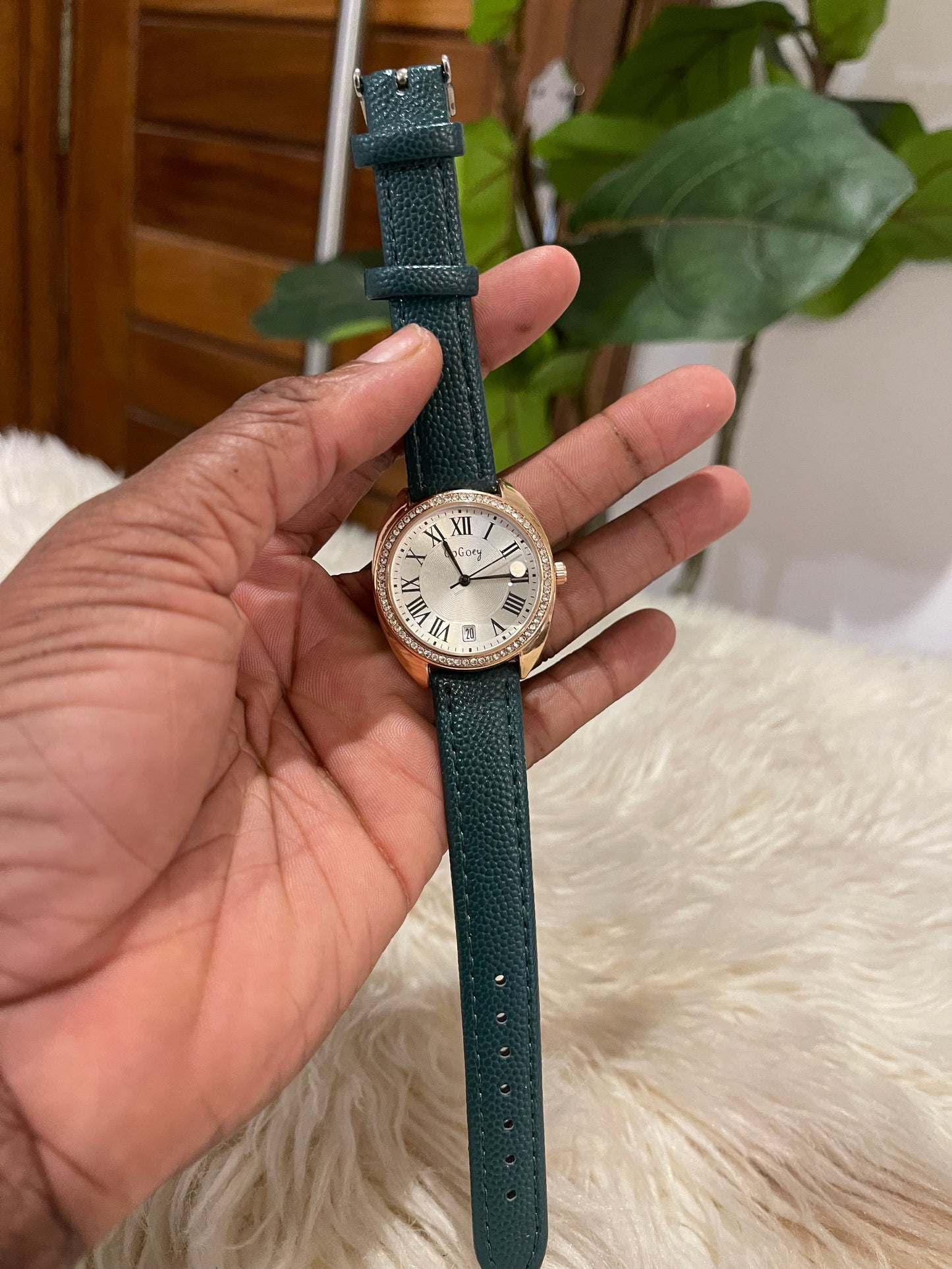 Green leather wristwatch