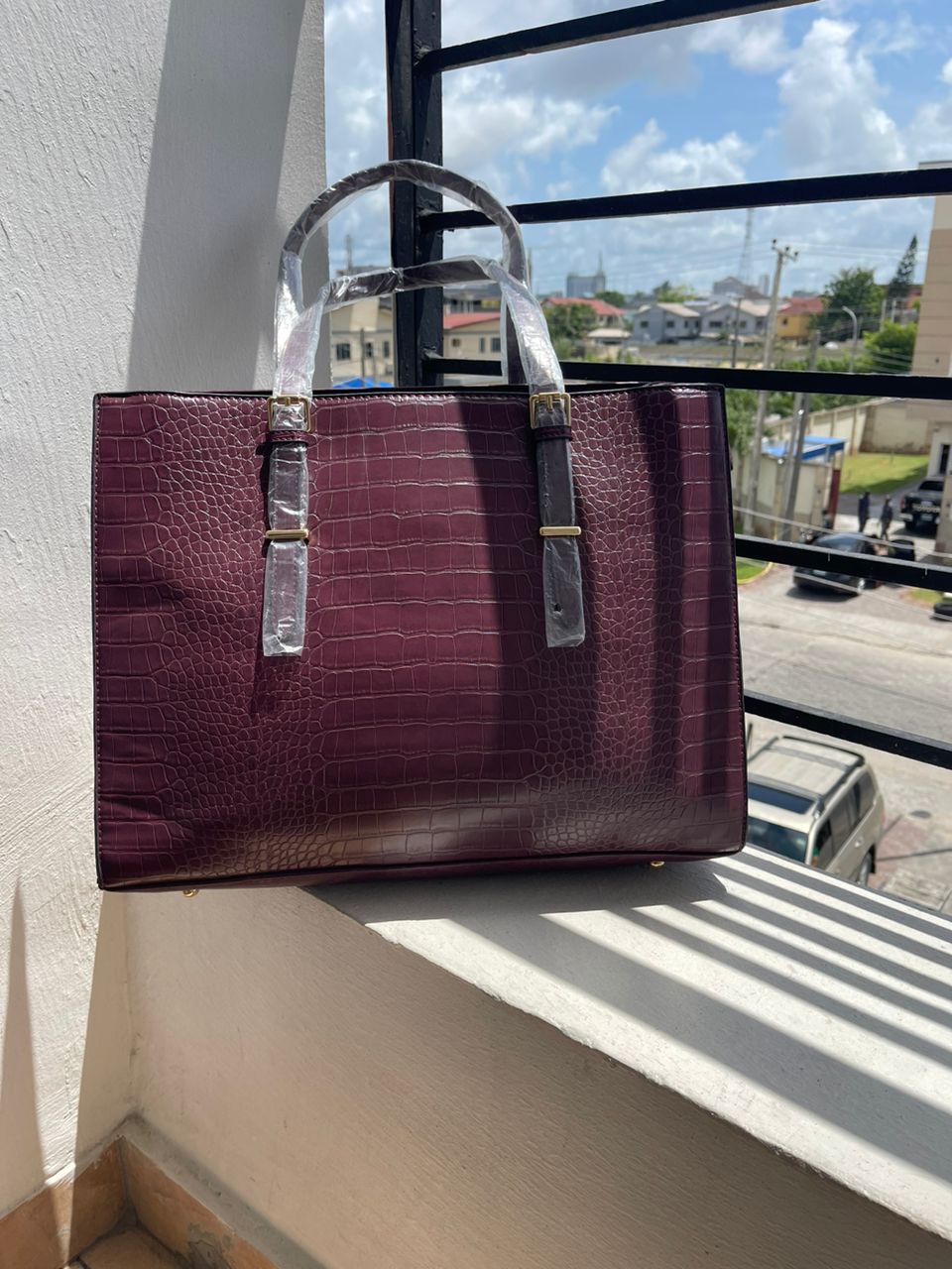 Structured maroon laptop bag with compartments