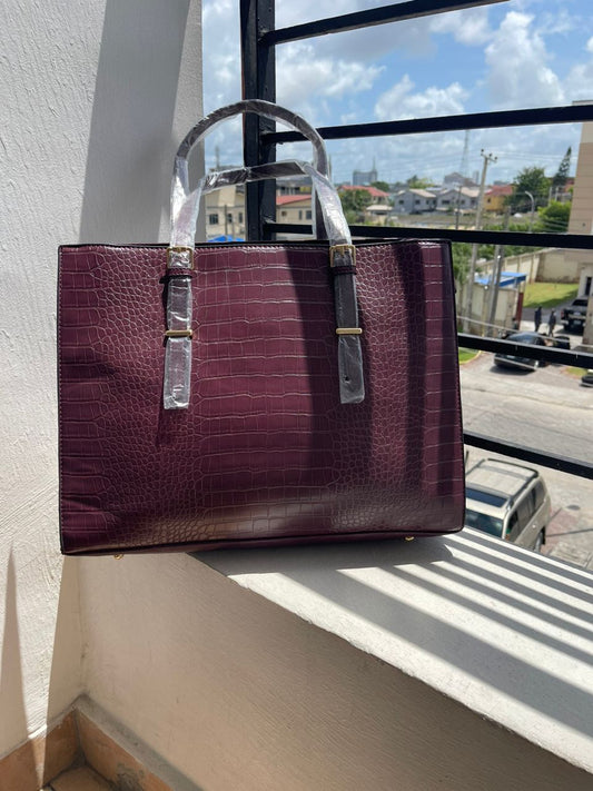Structured maroon laptop bag with compartments