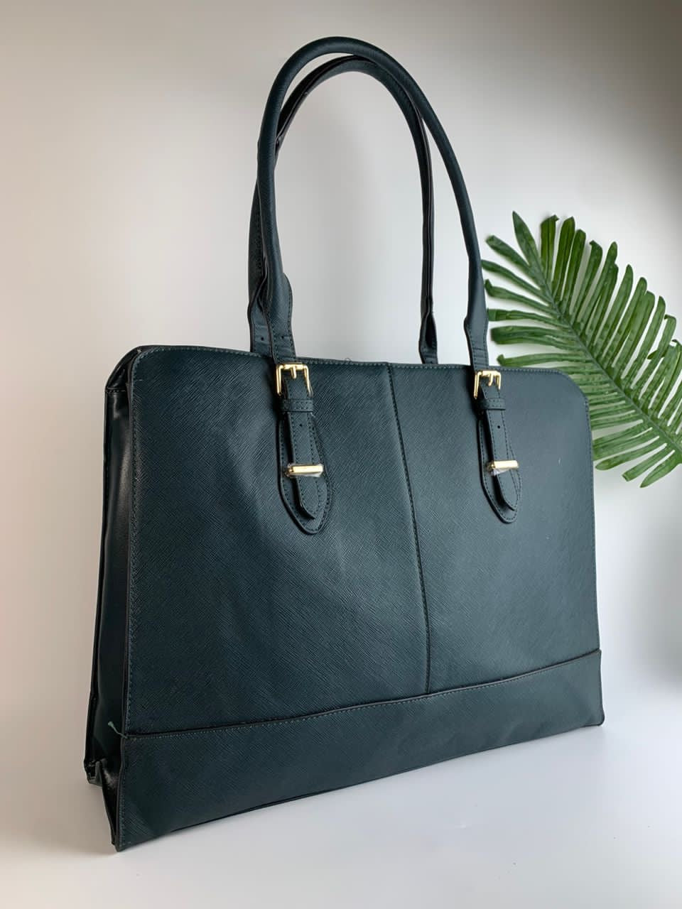 Green laptop bag with compartments
