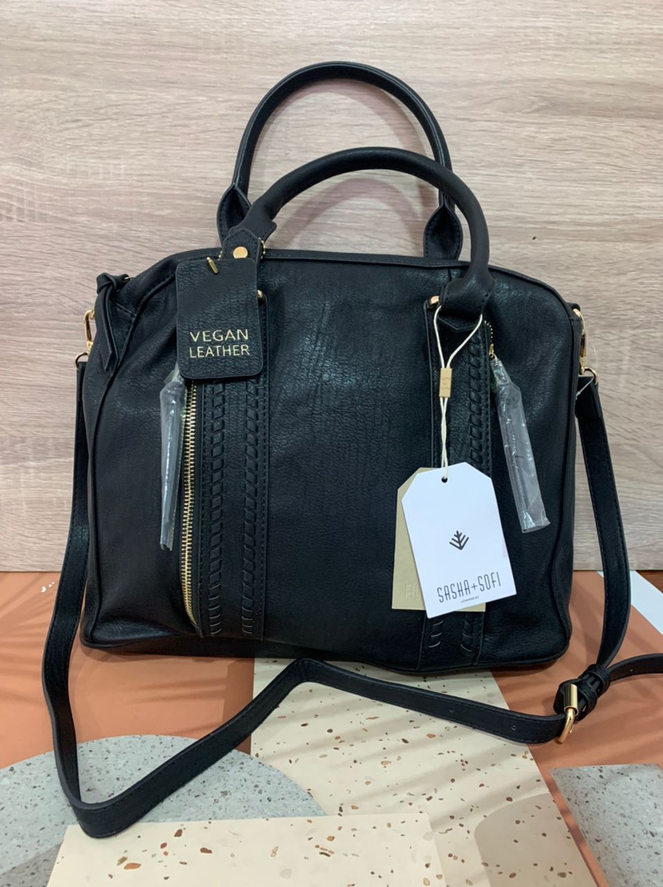 Black handbag with two top handle