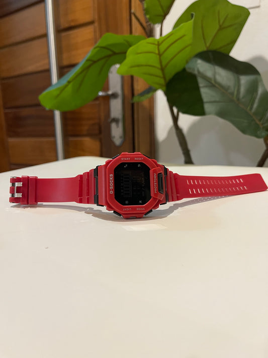 Red Digital watch with alarm nd light