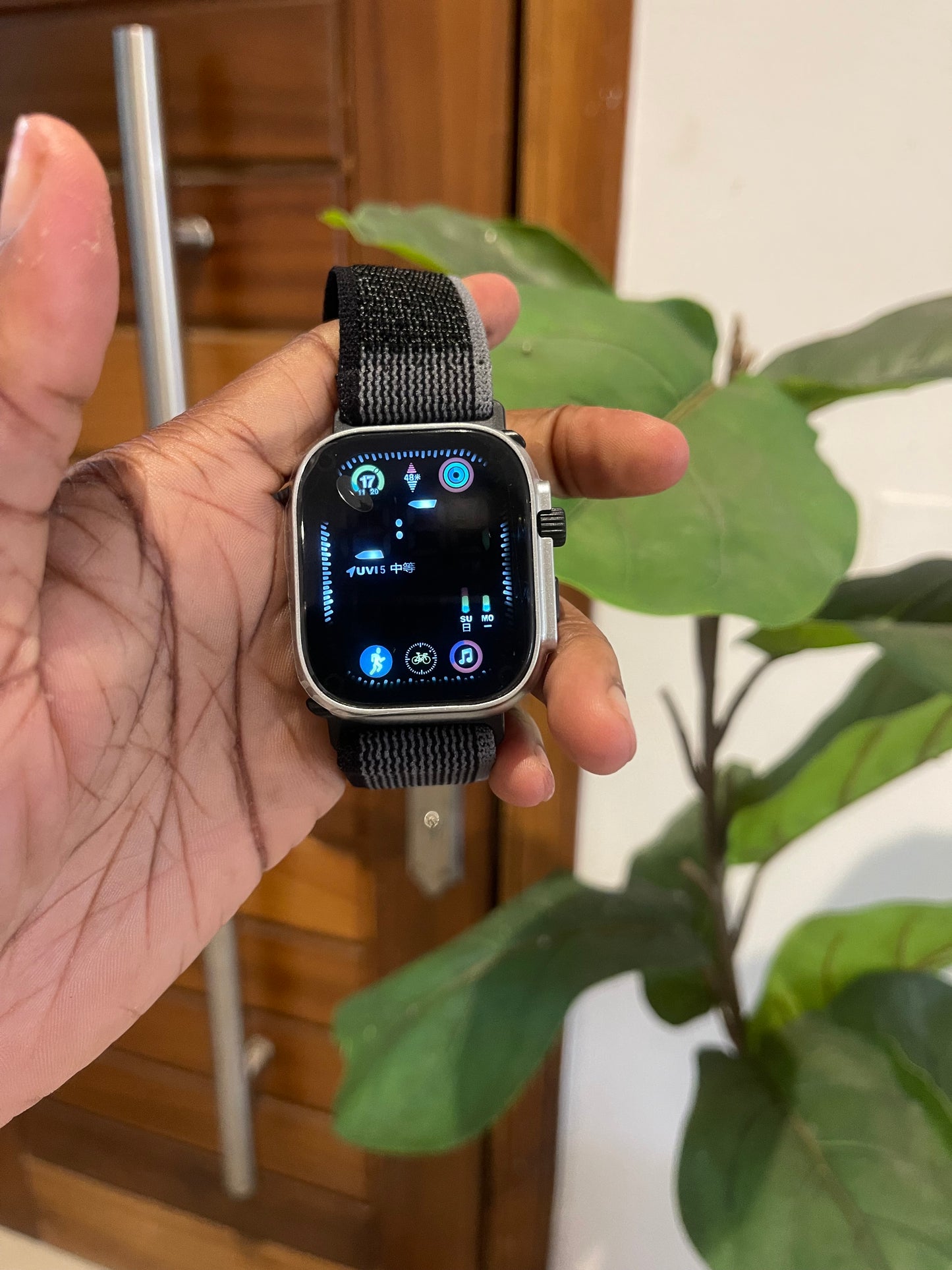 Digital wristwatch with adjustable strap