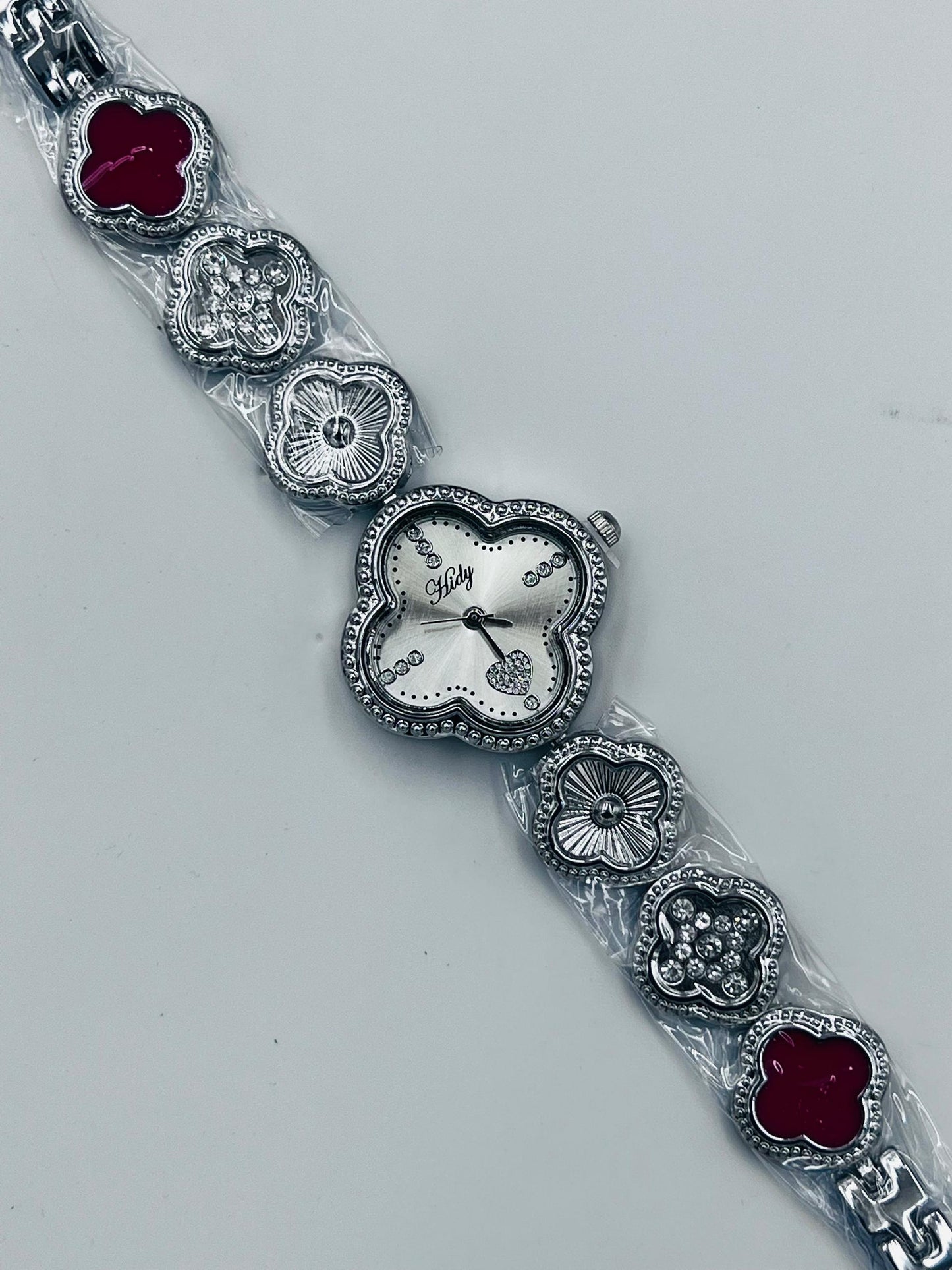 Silver van cleef inspired wristwatch