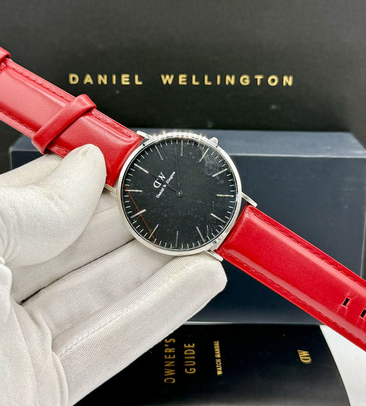 Red Daniel Wellington watch with bag