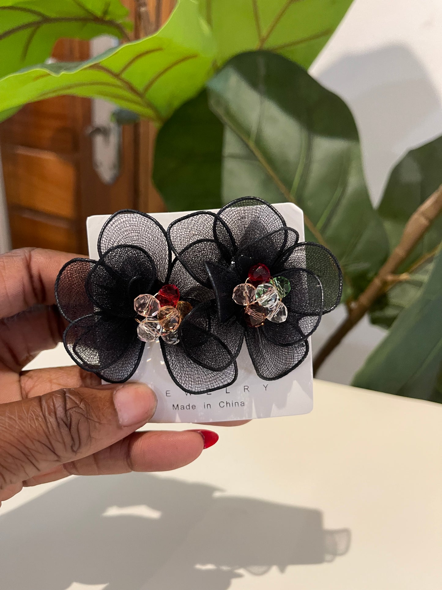 Black floral-inspired earring