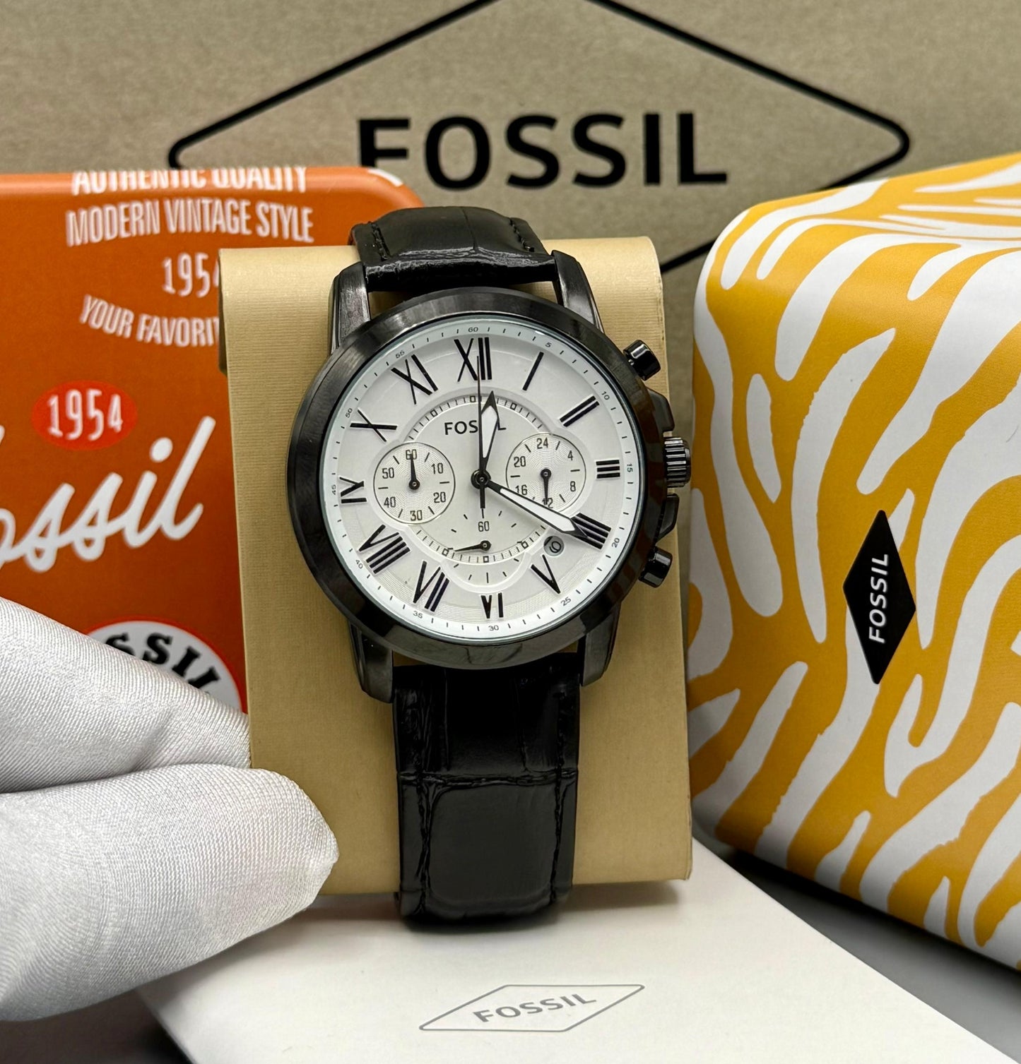 Black fossil wristwatch comes as seen