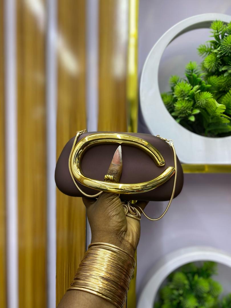 Maroon Owambe purse  comes in a box