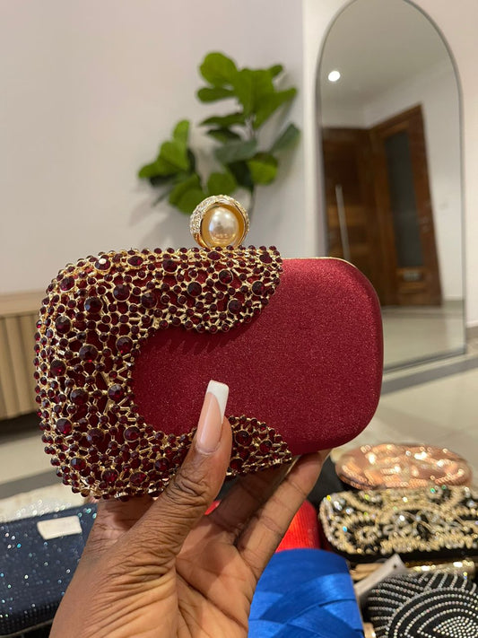 Maroon colored midi purse