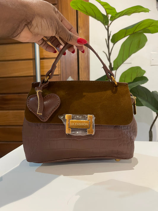 H monogrammed midi bag with bag charm