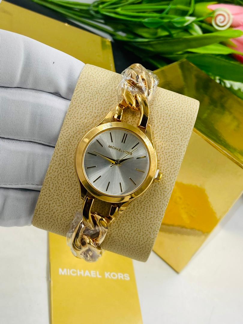 Gold MK wristwatch