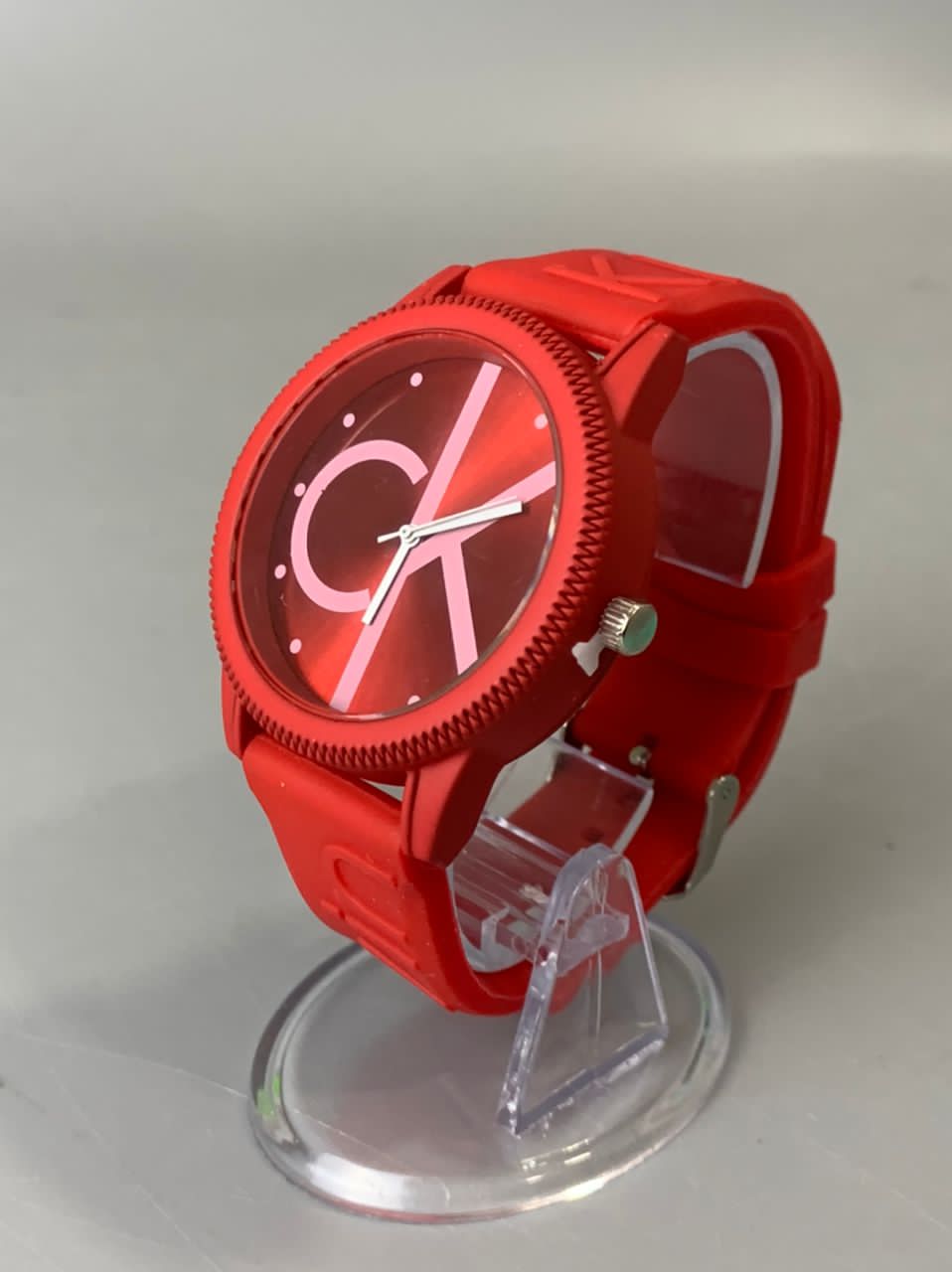 CK red wristwatch