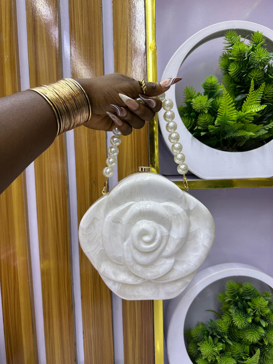 White floral shaped purse with beaded straps
