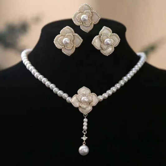 Floral pearl necklace and earring set