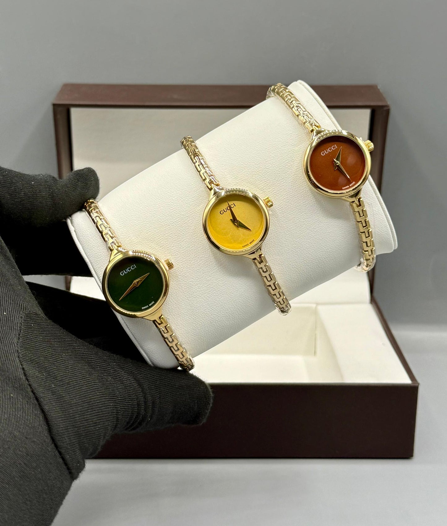 Minimalist gold wristwatch with box