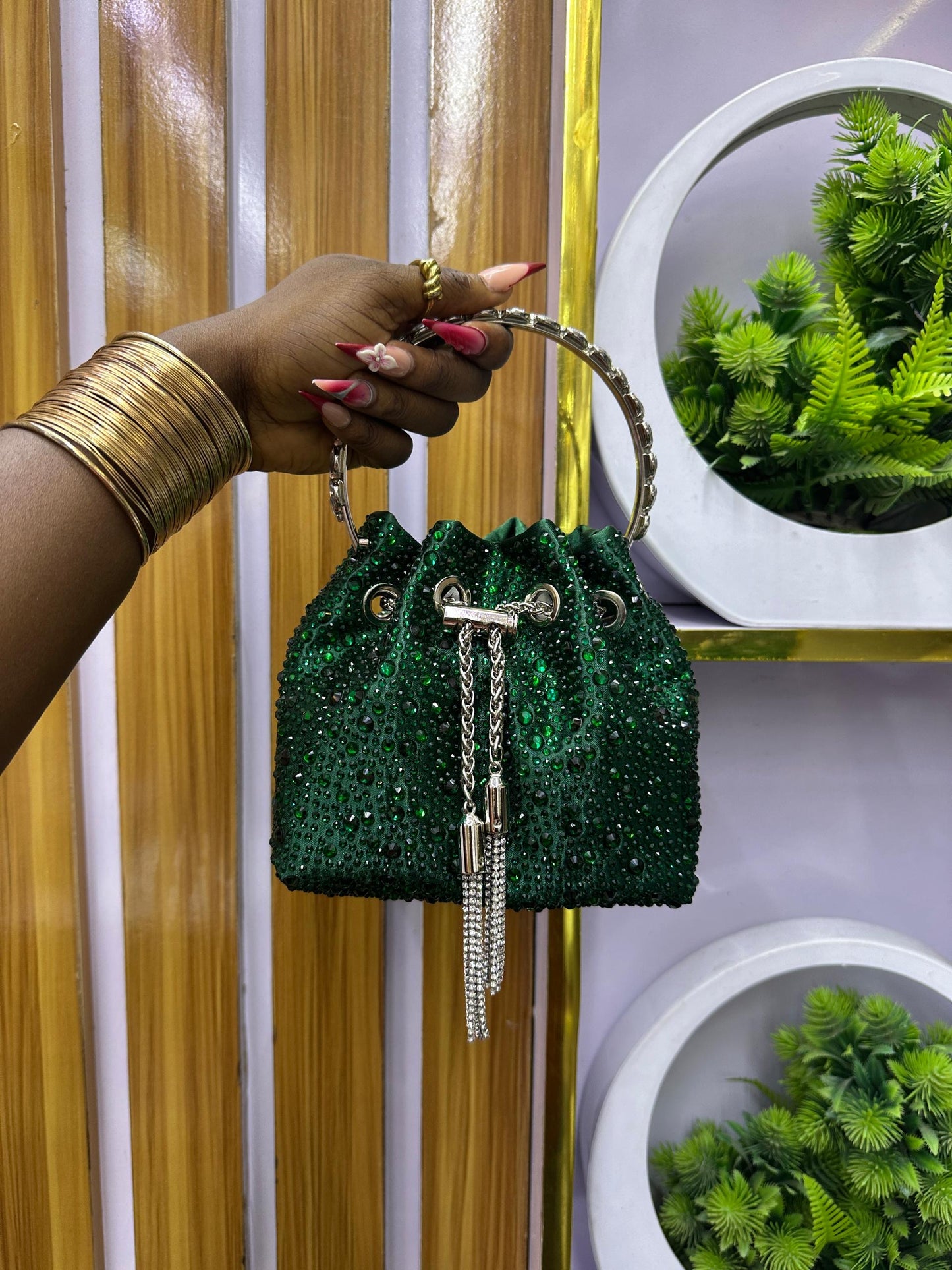 Green drawstring purse with tassels