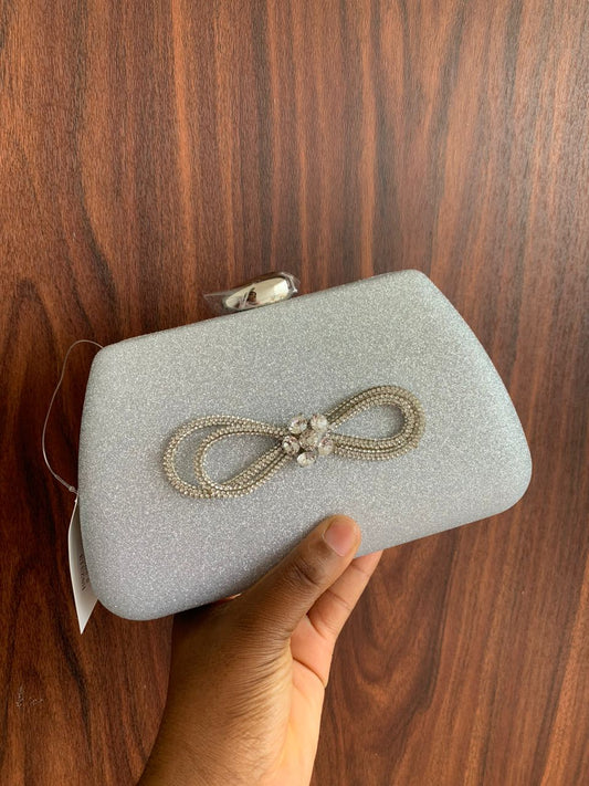 Silver bow inspired purse